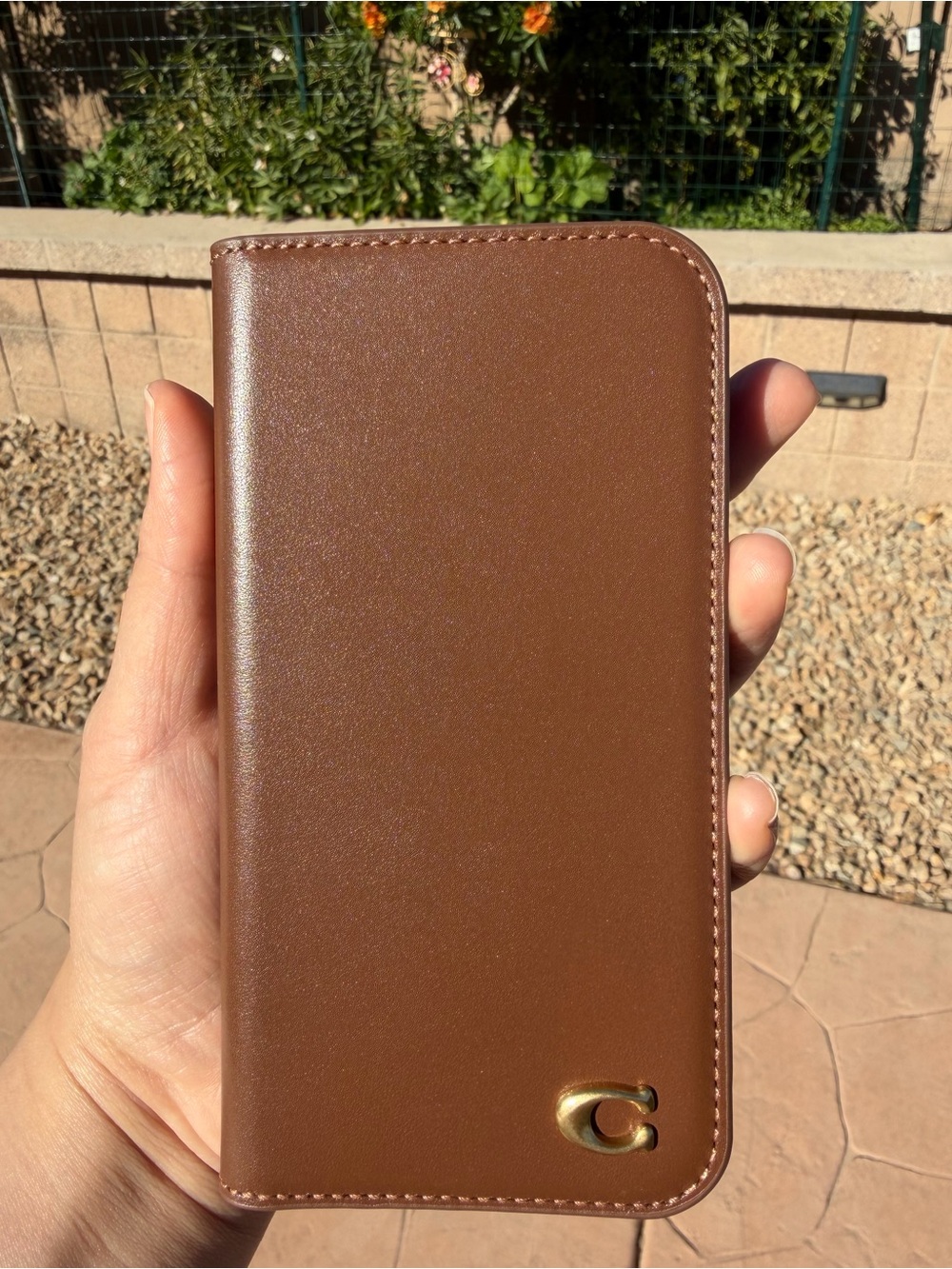 Coach Brown Leather Folio Phone Case with Gold 'C' Accent